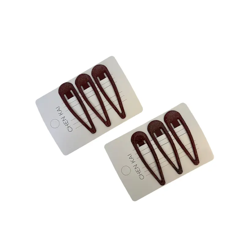 Barrette à cheveux bordeaux - Sourour Jarboua.webp
